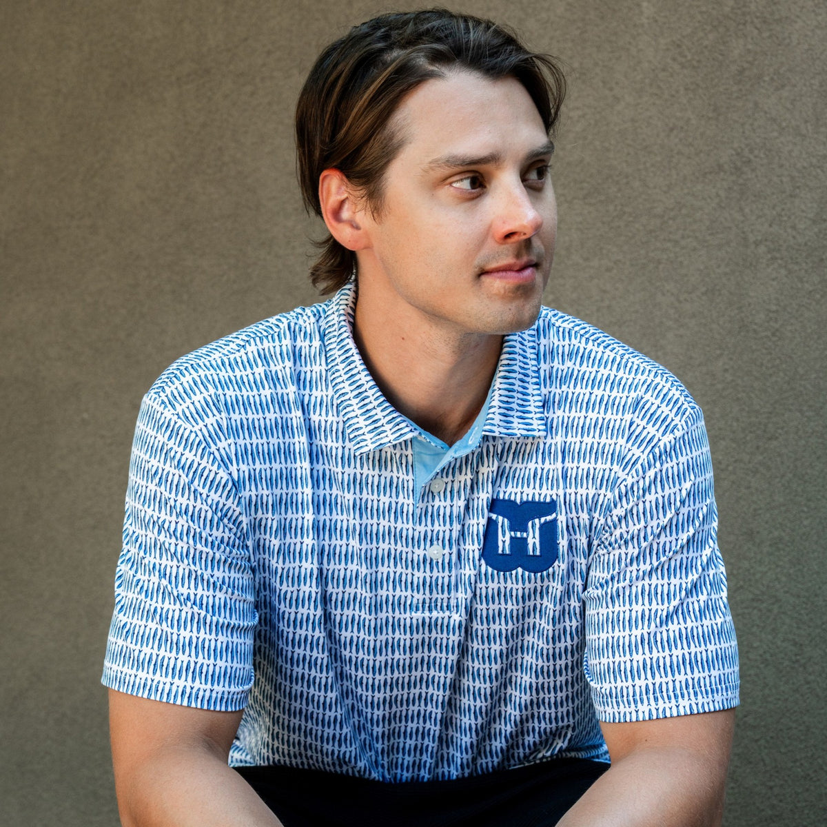The polo being worn outside by Hurricanes forward Sebastian Aho