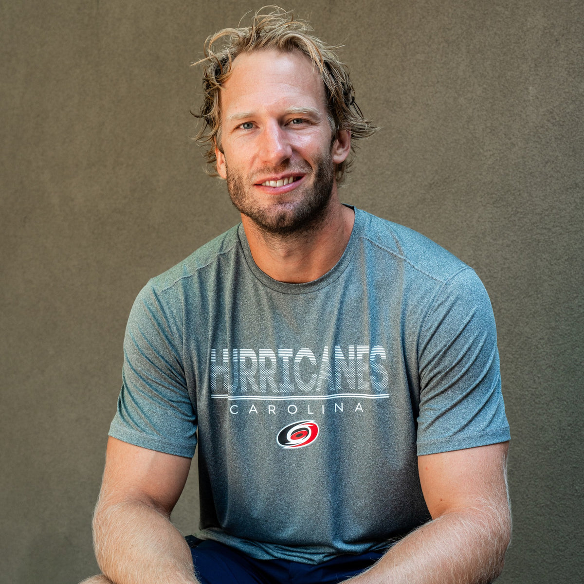 The tee being worn by Hurricanes Captain Jordan Staal outdoors
