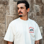 The tee being worn by Hurricanes forward Seth Jarvis outdoors