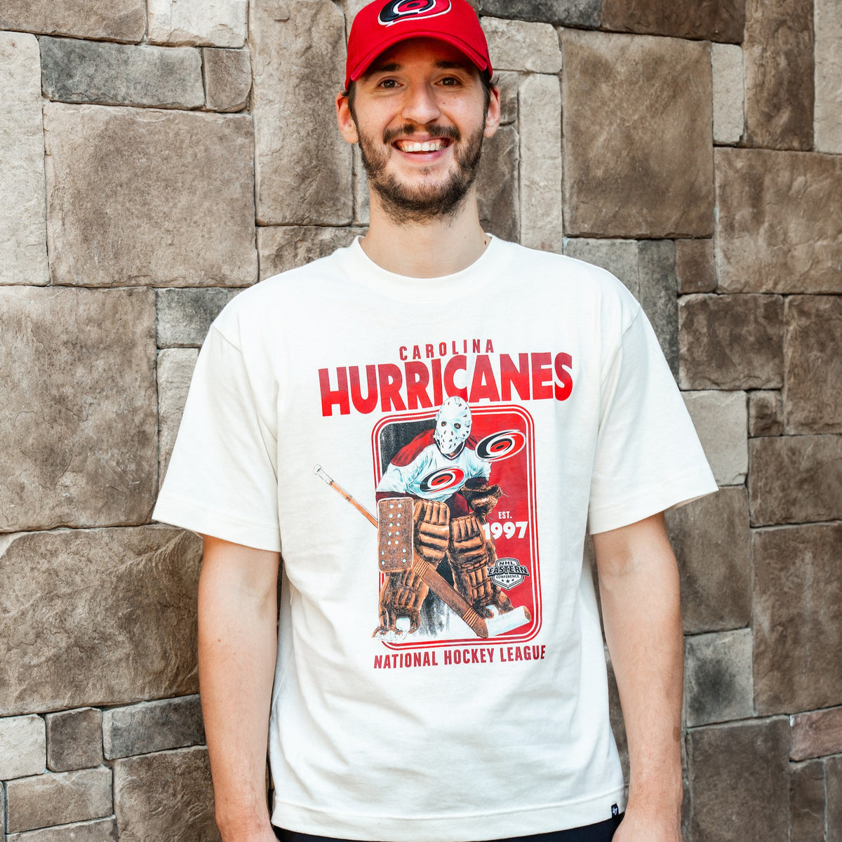 The tee being worn by Hurricanes goaltender Brandon Bussi