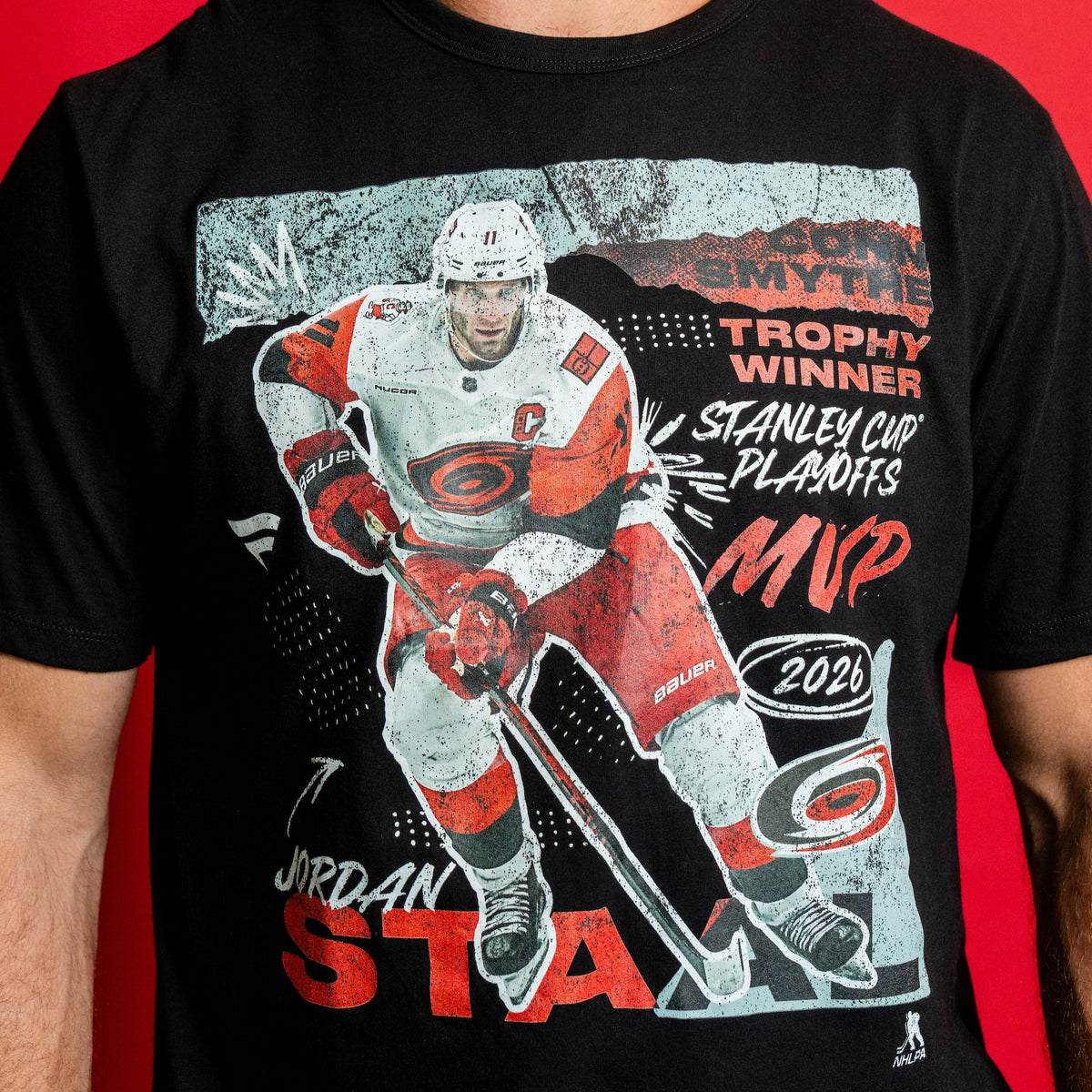 Black graphic tee, artwork of Jordan Staal; "CONN SMYTHE TROPHY WINNER STANLEY CUP PLAYOFFS MVP 2026"
