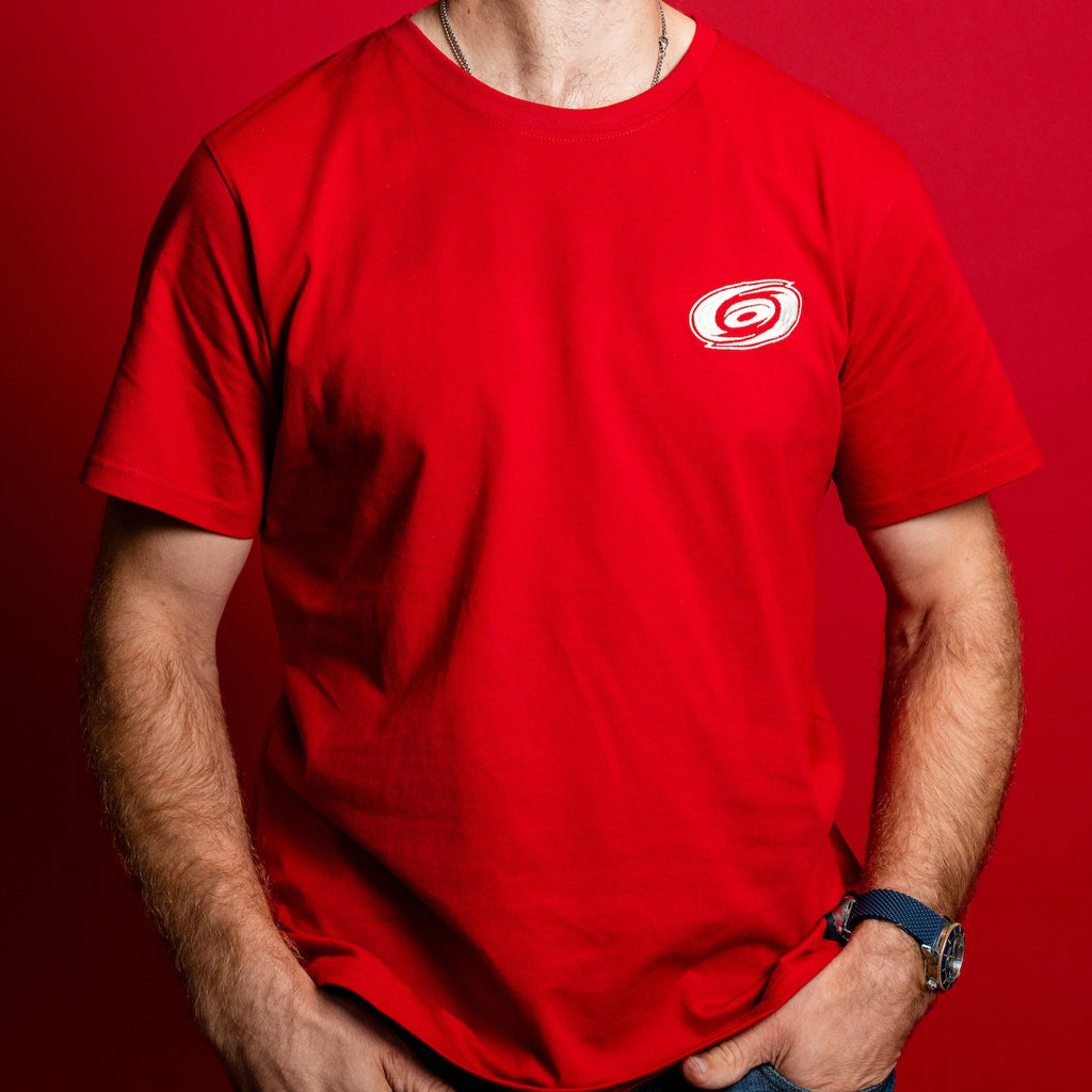 Front: Red short-sleeve tee, all-white Primary logo on left chest