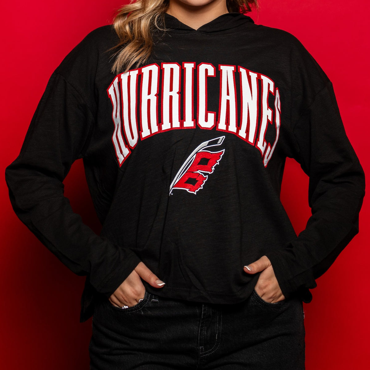 Black lightweight pullover hoodie, "HURRICANES" in white/red arched with Flags logo beneath on front