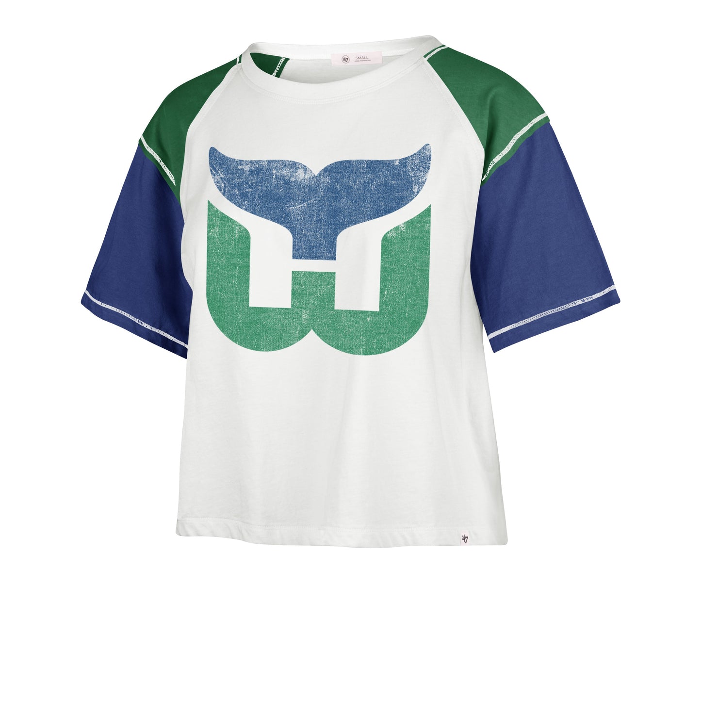 Front: white crop top with blue and green sleeves, Whalers logo on front