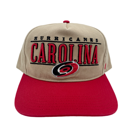 Front: Biege hat with red brim, graphic says Carolina Hurricanes in red/black with primary logo