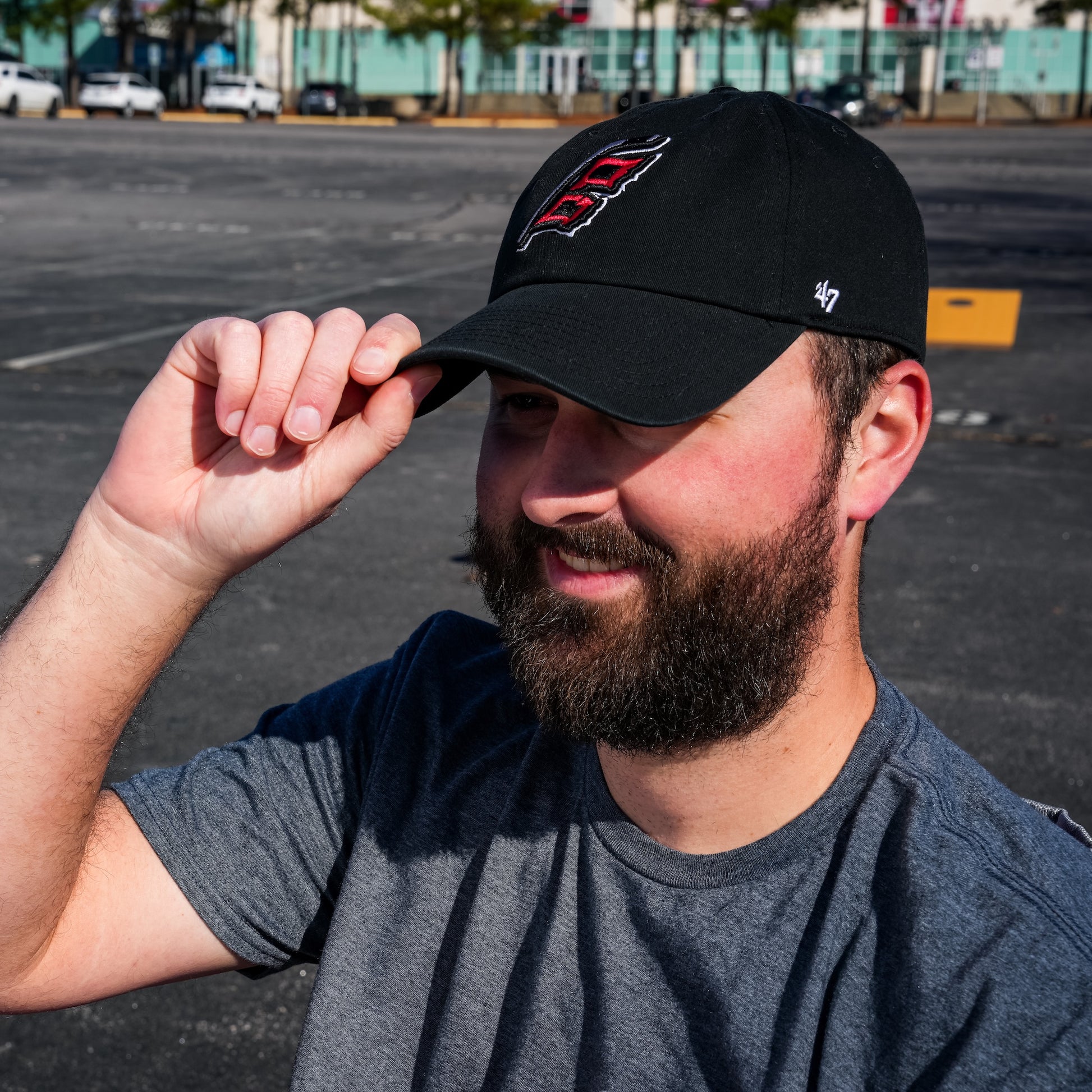 A local Caniac outside the Lenovo Center wearing the hat