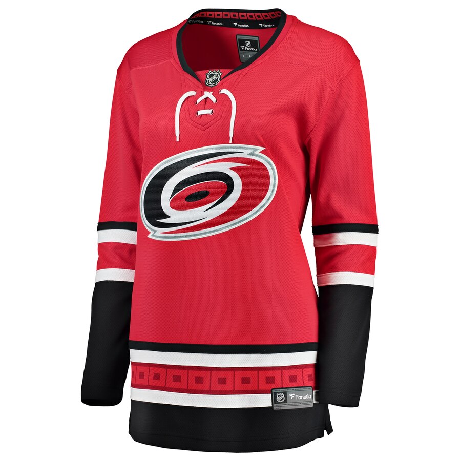 Front: v-neck red jersey with black and white trim, Primary logo on front