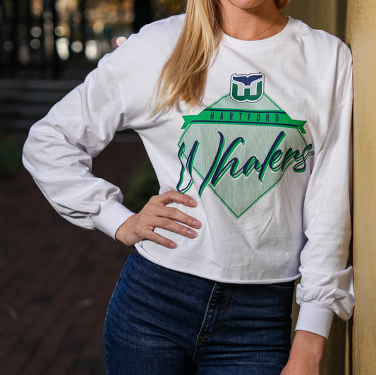 White longsleeve with green and blue diamond-shaped Hartford Whalers graphic on front