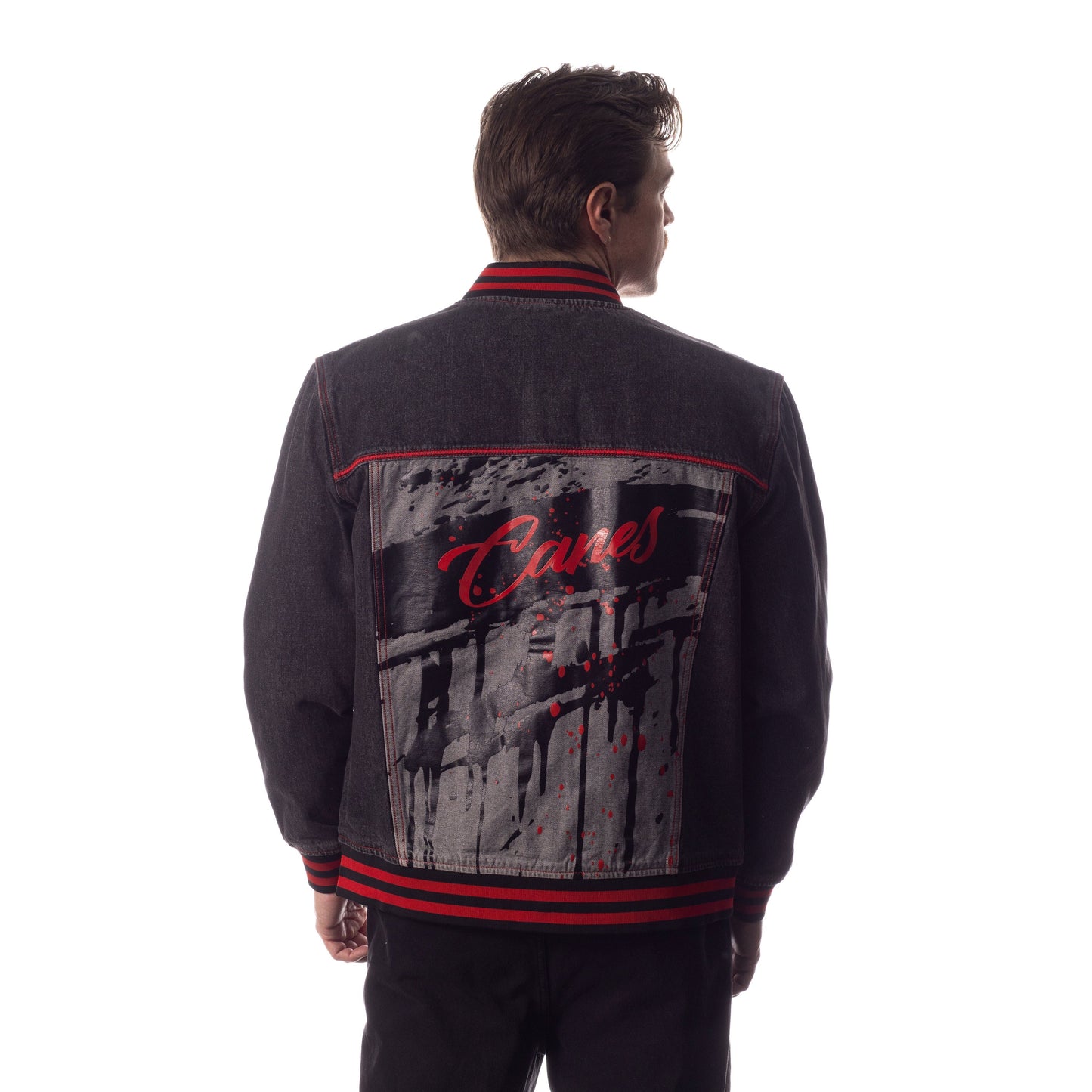 Back: Black denim jacket with large graphic on back, red and black striping