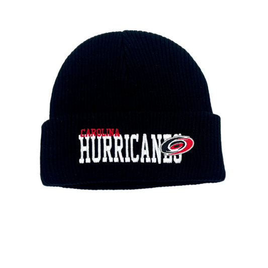 Front: Black cuffed knit, says Carolina in red Hurricanes in white with primary logo on cuff