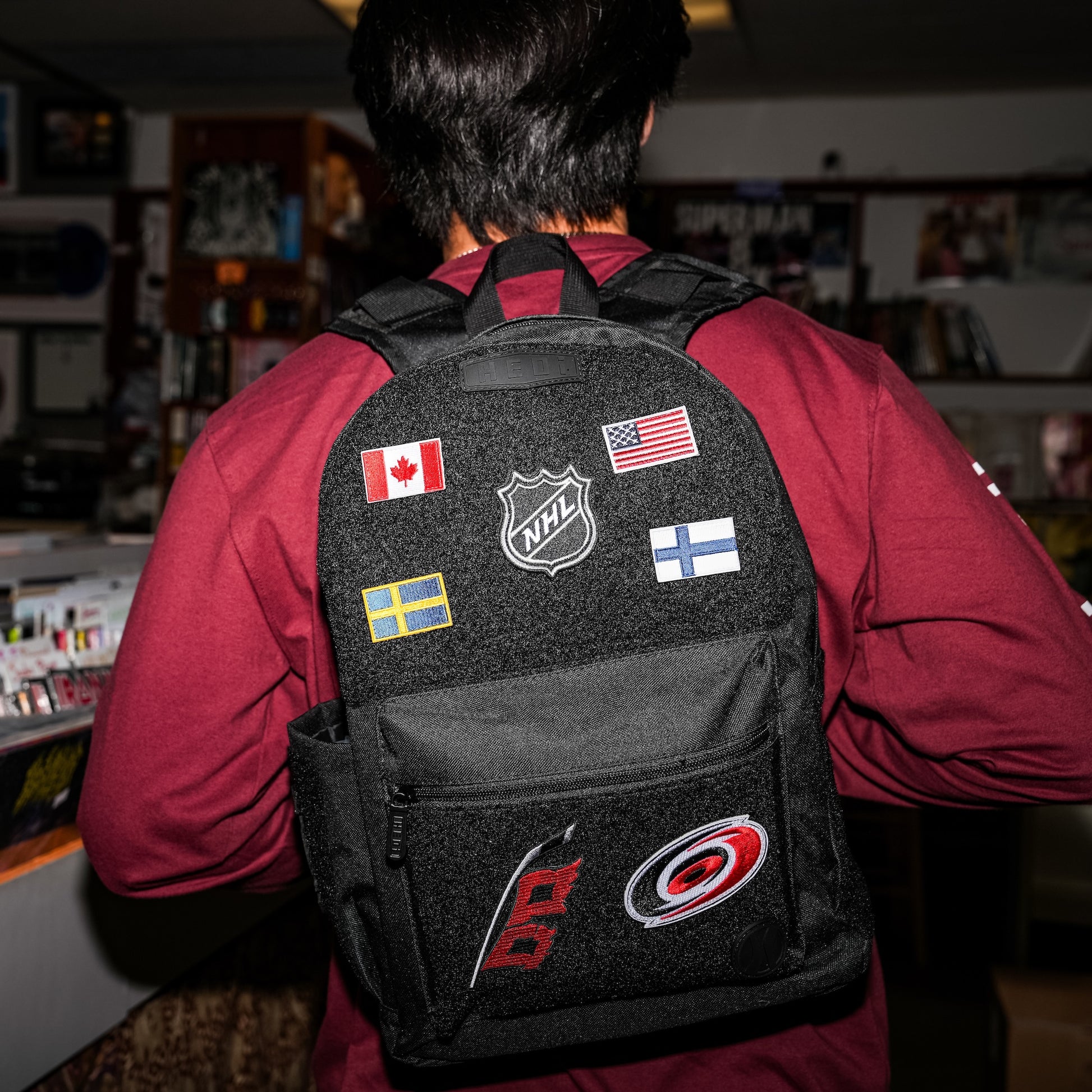 The Canada patch on the back of the HEDi backpack with an assortment of patches
