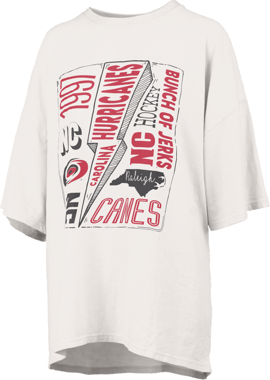 Oversized cream colored tee with School of Rock Hurricanes graphic on front