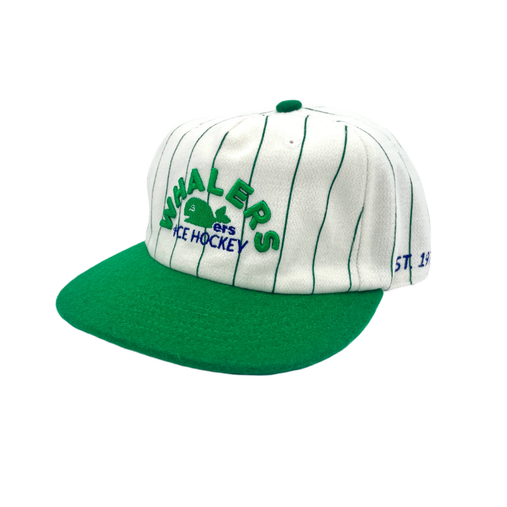 Side: Cream hat with green pinstripes, green brim, says "EST. 1979" on left