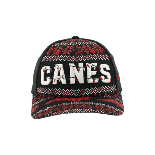 Front: Black hat with festive Christmas sweater pattern, “CANES” in white wrapped in Christmas lights