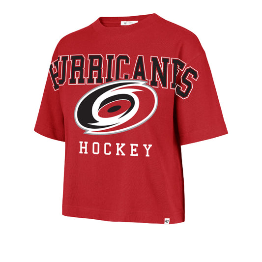 Front: Red cropped tee, "HURRICANES" in black across chest and sleeves, Primary logo/"Hockey" below