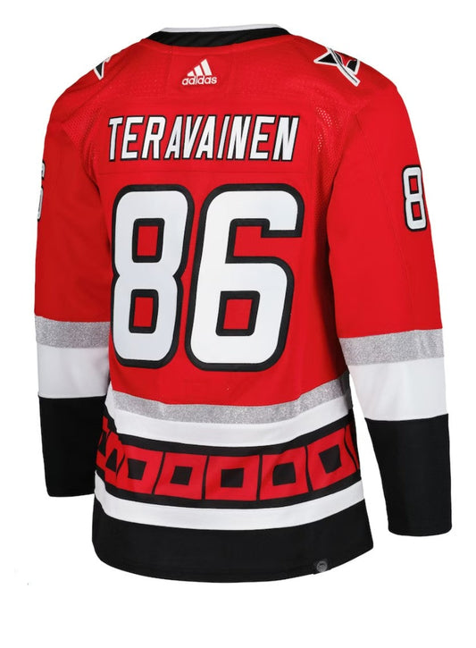 Back: Red Hurricanes anniversary jersey with Teravainen 86 on back