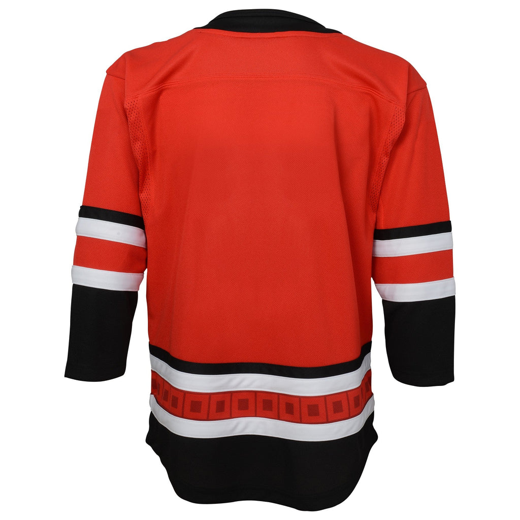 Back: red jersey with black and white trim, flag striping
