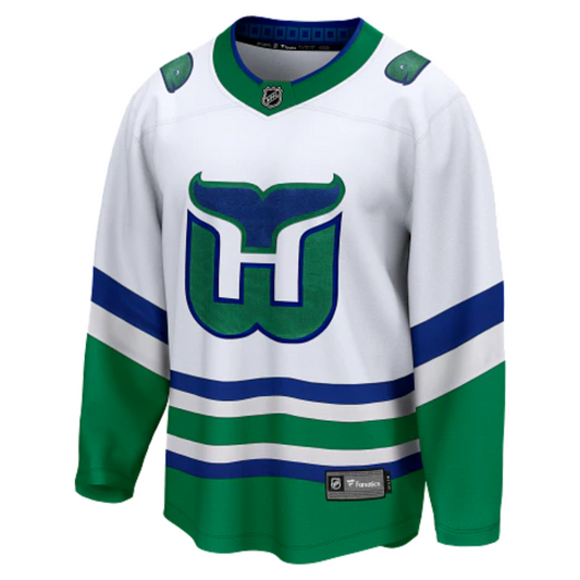 Front: White jersey with green and blue striping, Whalers crest on front