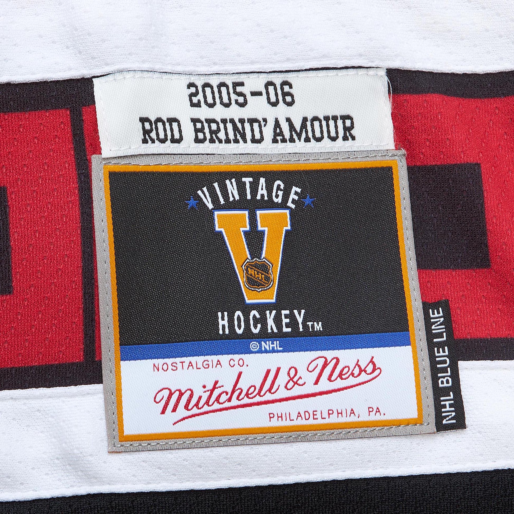 close up of Mitchell&Ness Vintage Hockey tag on front of jersey