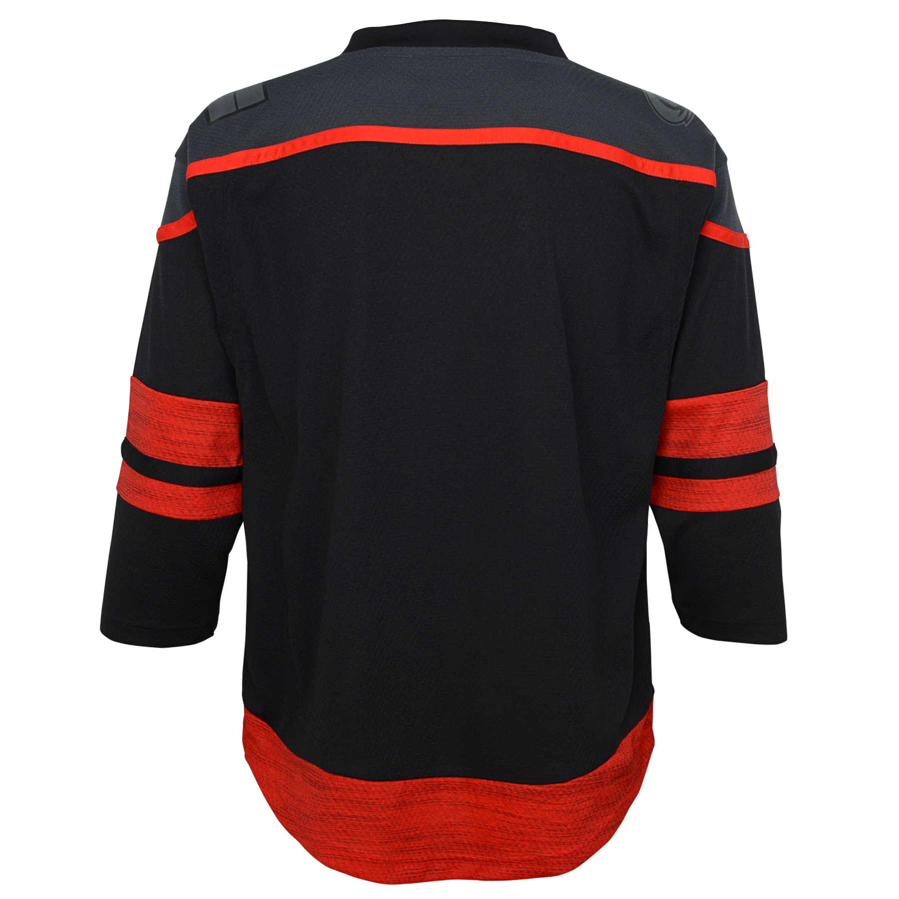 Back: black jersey with dark gray shoulders and red trim, blackout patches on shoulders