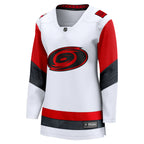 Front: White jersey, red/heather black striping, Tonal Primary logo crest, v-neck, slimmer cut