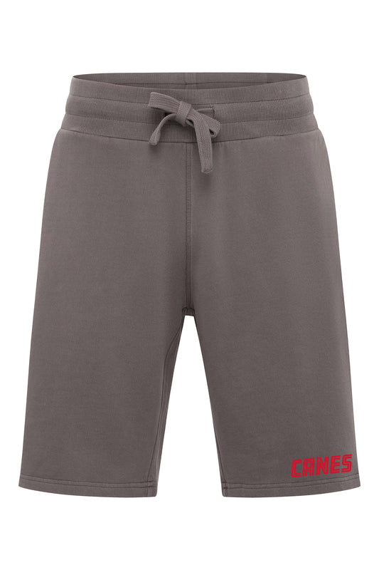 Dark gray shorts with drawstrings, CANES in red at bottom of left pant