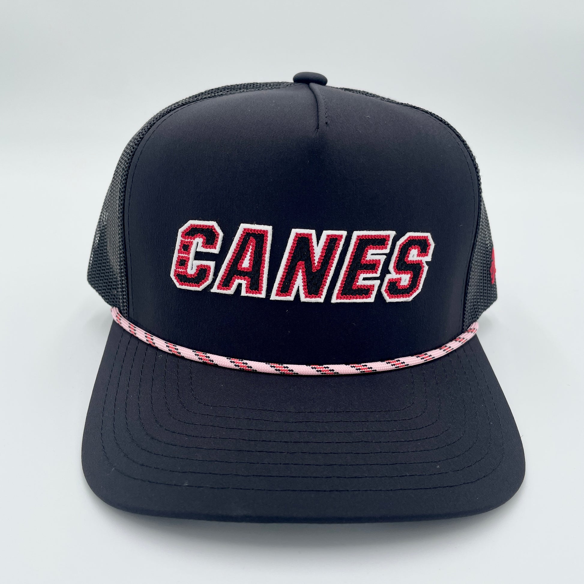 Black trucker hat with tri-colored rope, CANES wordmark on front