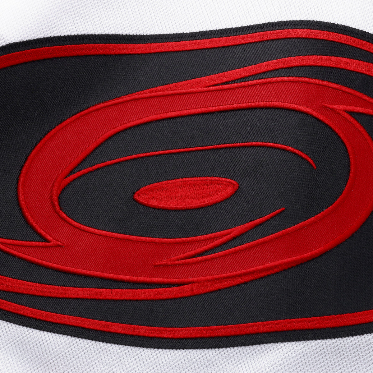 Close up of Tonal Primary logo on front