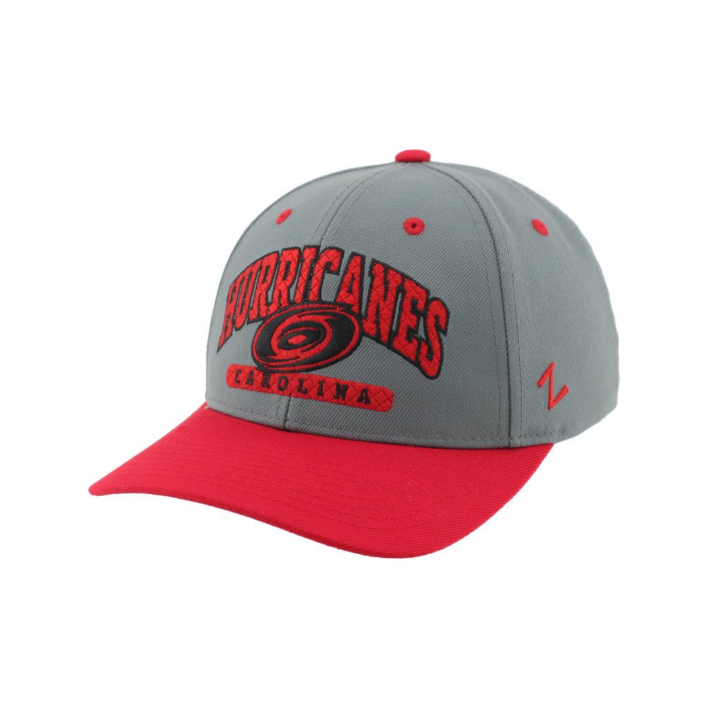 Front Left: Gray hat, red brim, red/black artwork on front featuring Tonal Primary logo