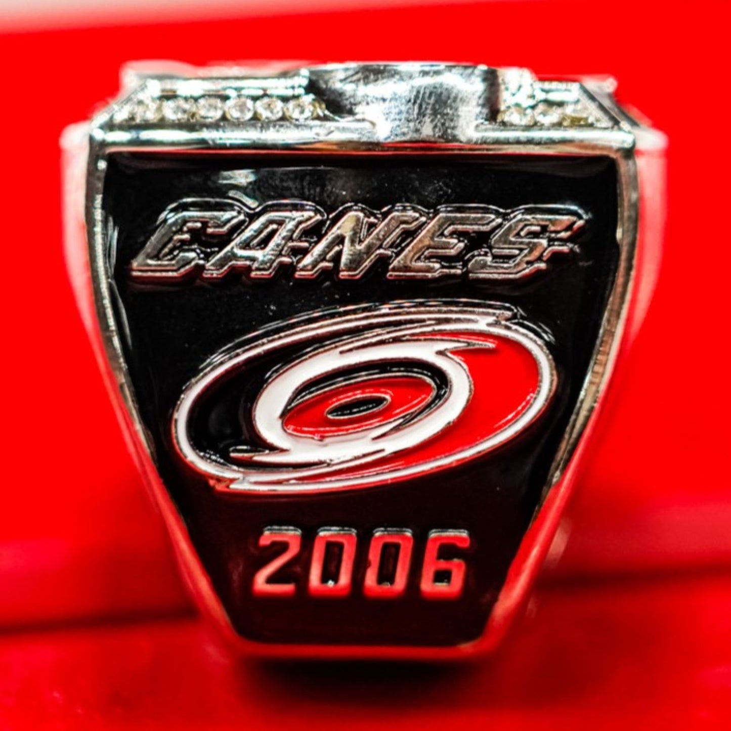 Side, "CANES" original wordmark, Primary logo, '2006' beneath logo
