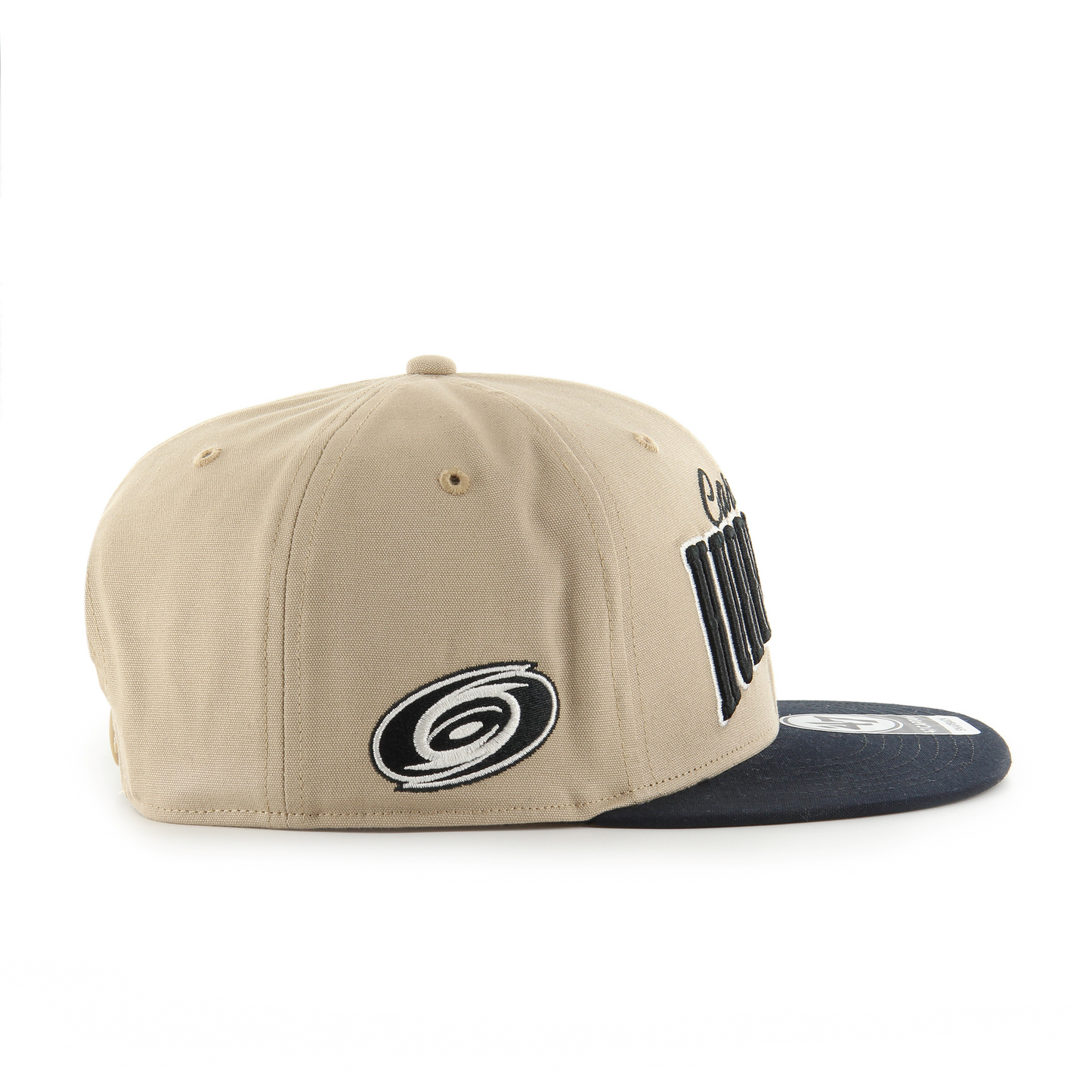 Side: Tan Snapback with black brim and Black and white primary logo on side