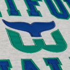 Close up of the Whalers Tail logo on the front
