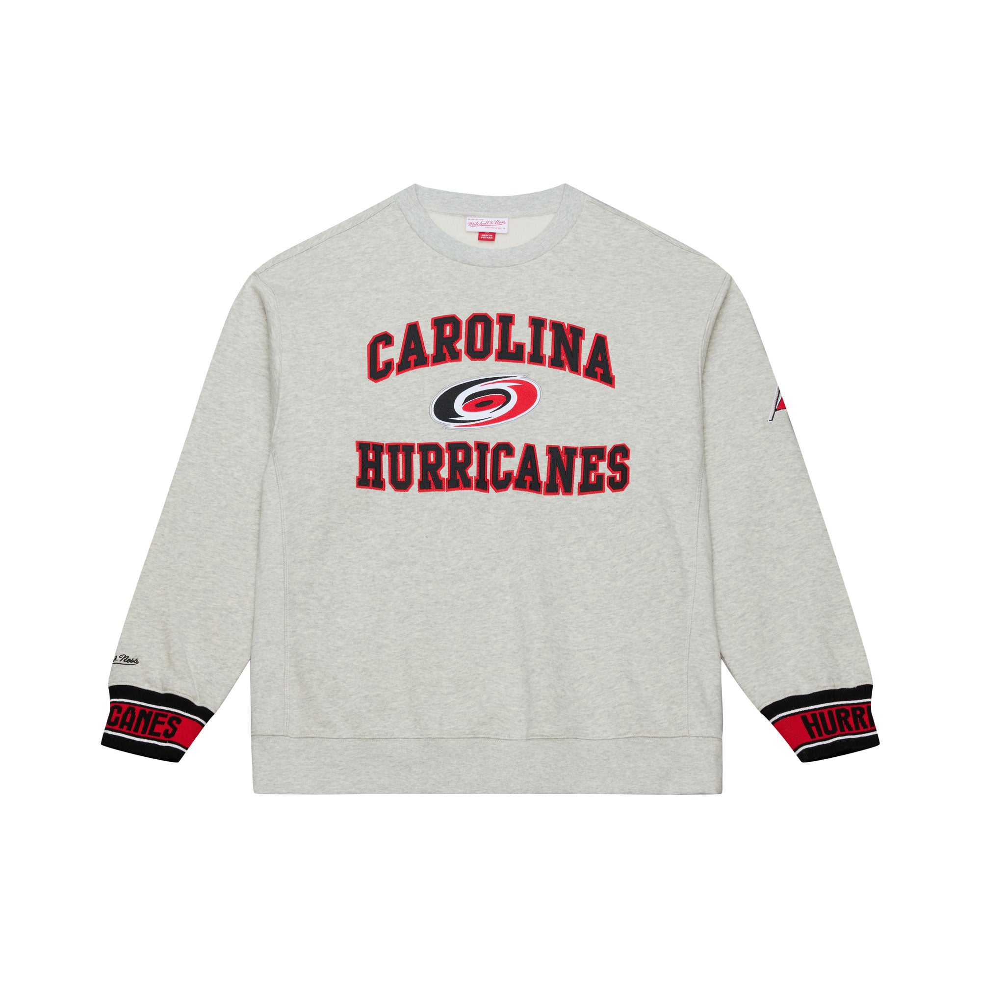 Front: Gray crewneck, "CAROLINA HURRICANES" on front in red/black with Primary logo