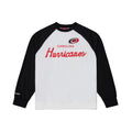 White crewneck, black shoulders/sleeves; "CAROLINA HURRICANES" in red across chest with Primary logo above