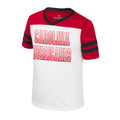 White tee, red shoulders/sleeves, black stripes on sleeves, "CAROLINA HURRICANES" in white/red across front