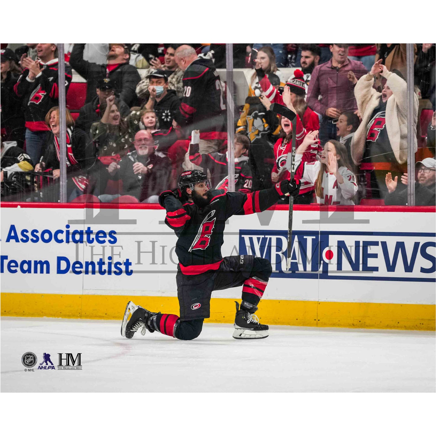 Photo of Jalen Chatfield hitting his signature celebration at a home game