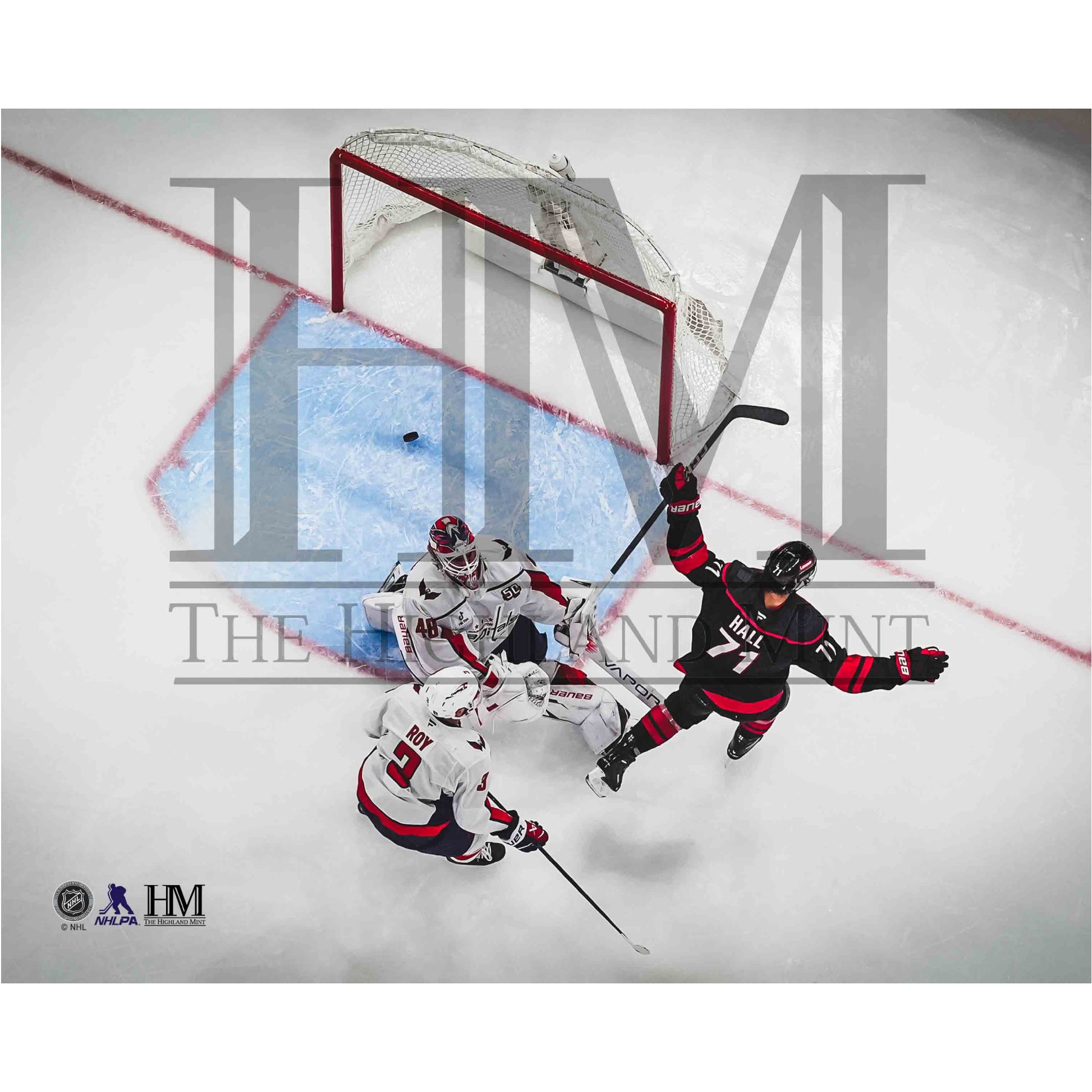 Photo from above of Taylor Hall celebrating during the 2025 Stanley Cup Playoffs