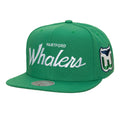 Front: Green flatbrim hat, "HARTFORD Whalers" in white across front, "Whalers" in curisve