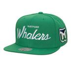 Front: Green flatbrim hat, "HARTFORD Whalers" in white across front, "Whalers" in curisve