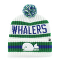 Front: White cuffed knit with pom, blue/green accents, white Pucky logo on cuff, "WHALERS" across front