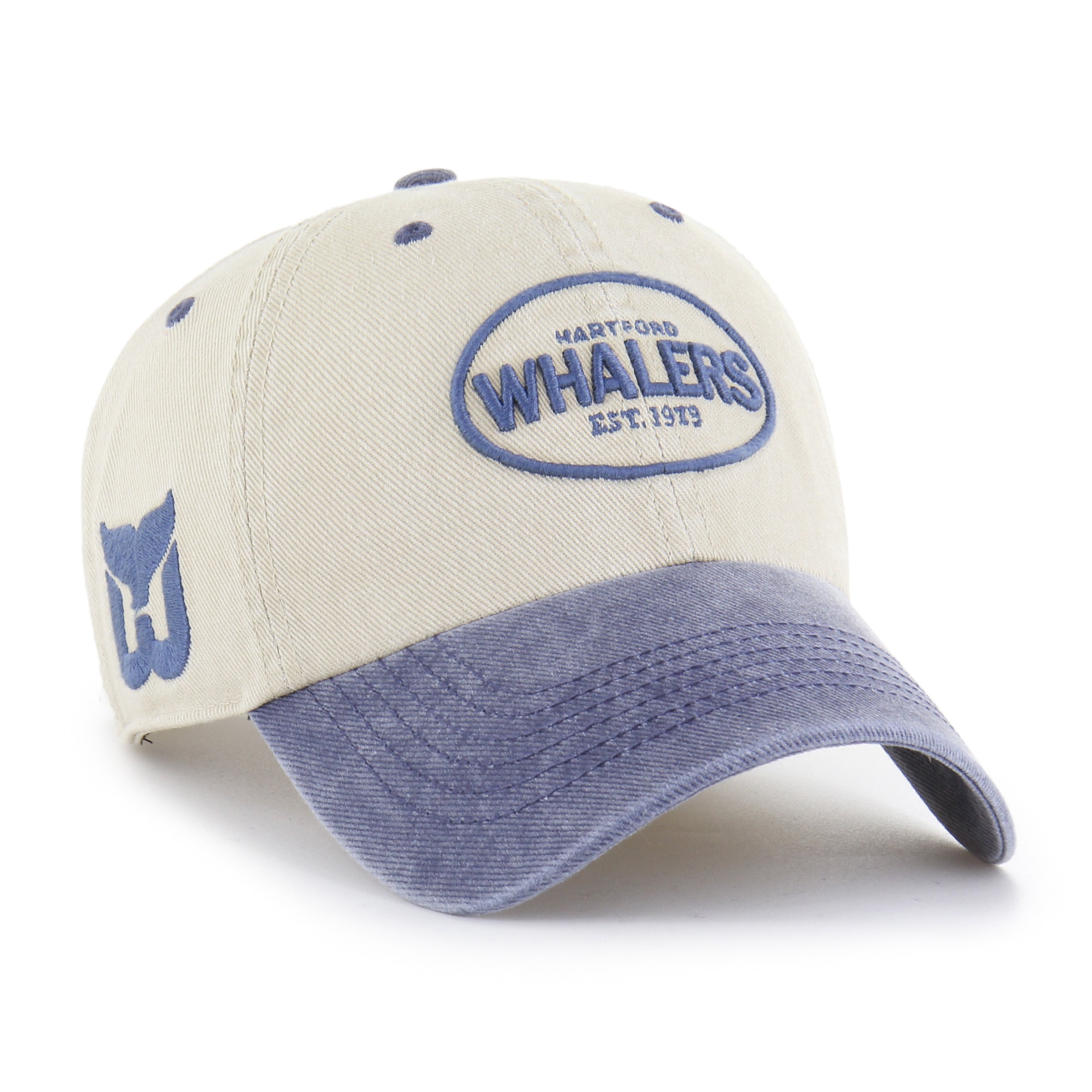Front 2: Cream hat, blue brim, blue Whalers tail logo on right