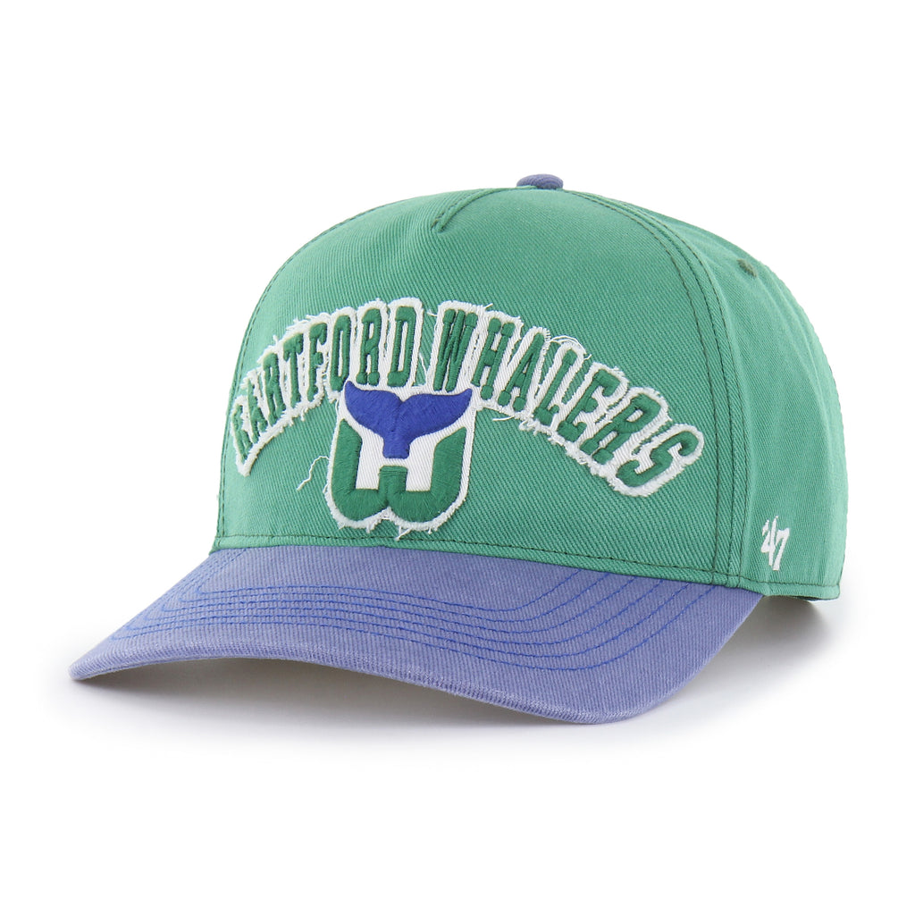 Front: Green hat, blue bill, "HARTFORD WHALERS" arched in green/white with Tail logo