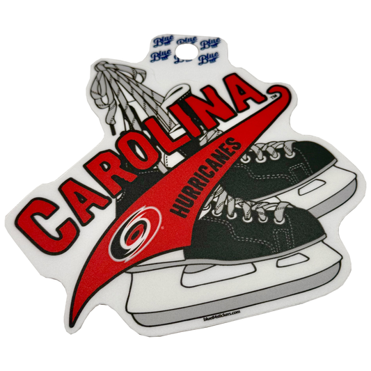 Sticker of hanging hockey skates, "CAROLINA HURRICANES" overtop in red/black