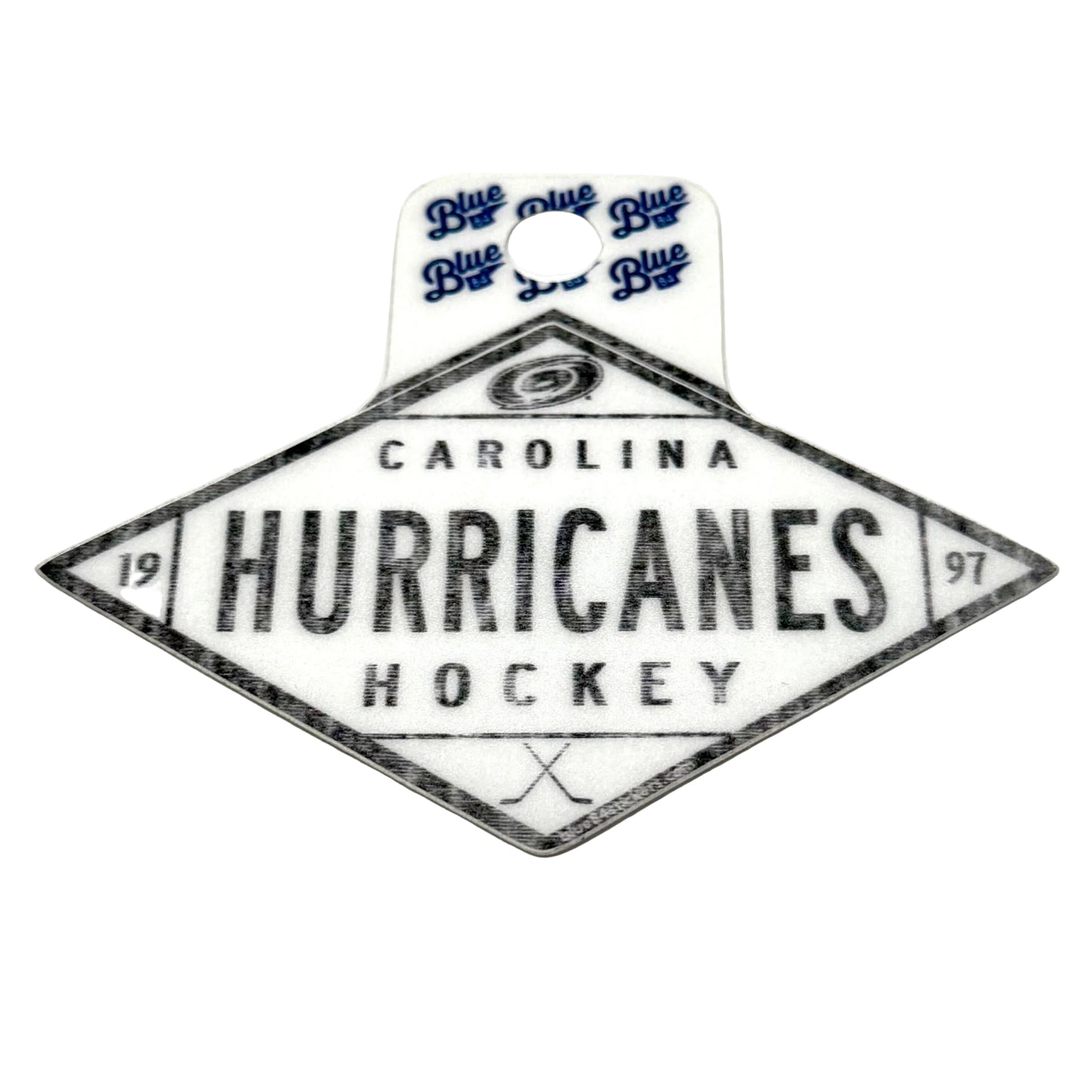 Rhombus-shaped sticker, "CAROLINA HURRICANES HOCKEY 1997" in black, white background