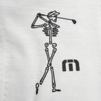Close up of Travis Mathew art, Skeleton playing golf next to TM logo