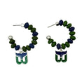 Green/blue beaded circular earrings with Whalers Tail dangling charm