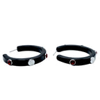 Black hoop earrings with red gem studs & silver studs with Primary logo outline pressed in