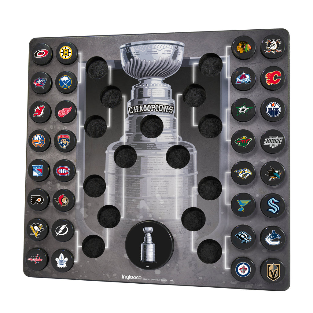 Angled view of the Mini Puck Plaque, featuring all 32 team pucks in a bracket-style layout