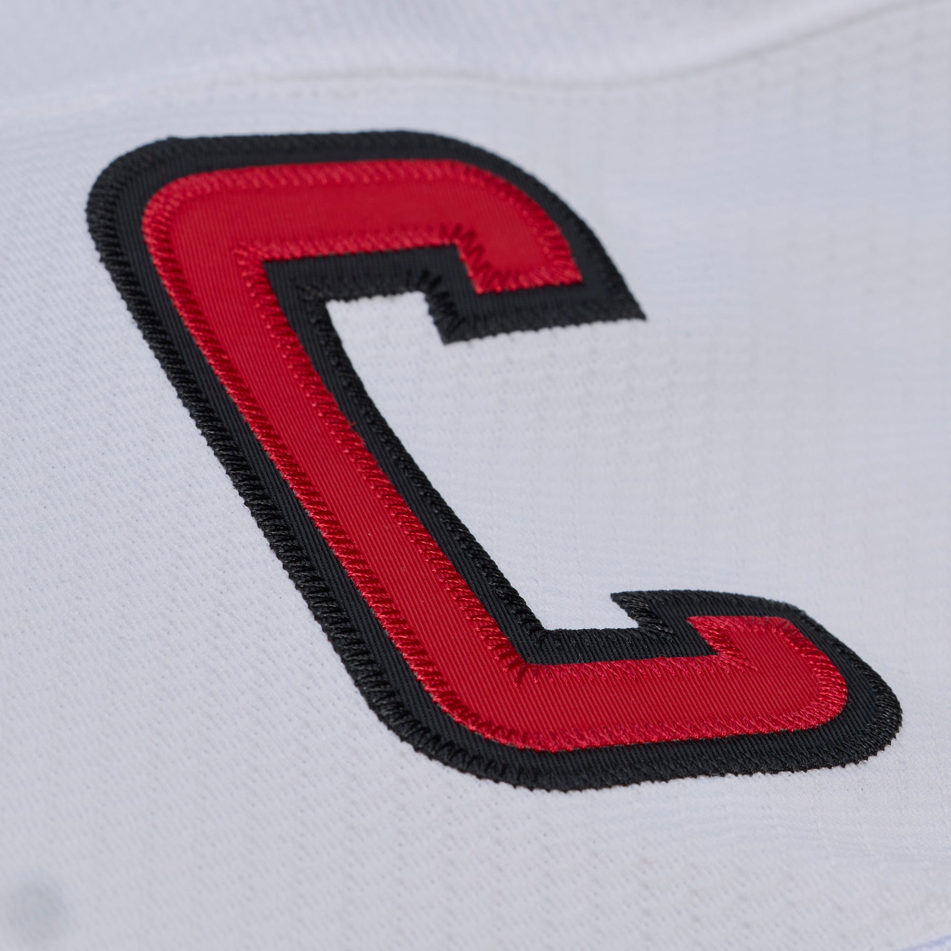 Close up of 'C' Captaincy patch on left chest