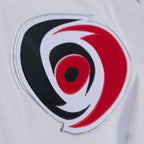 Close up of the Primary logo crest on the front